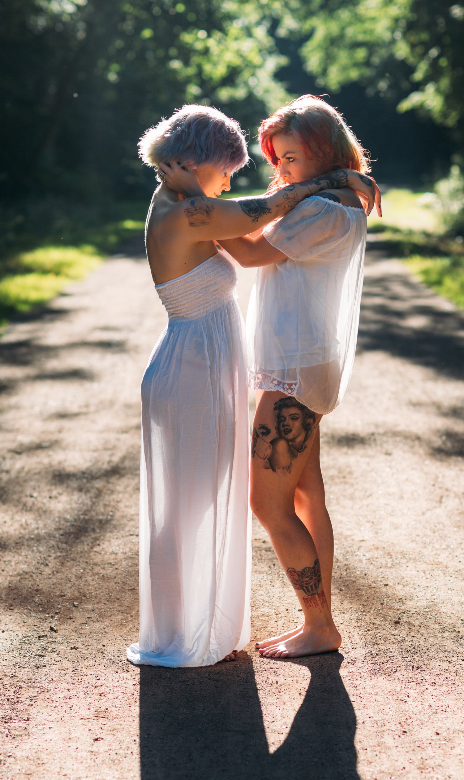 Couple two women embrace park love white – Portrait