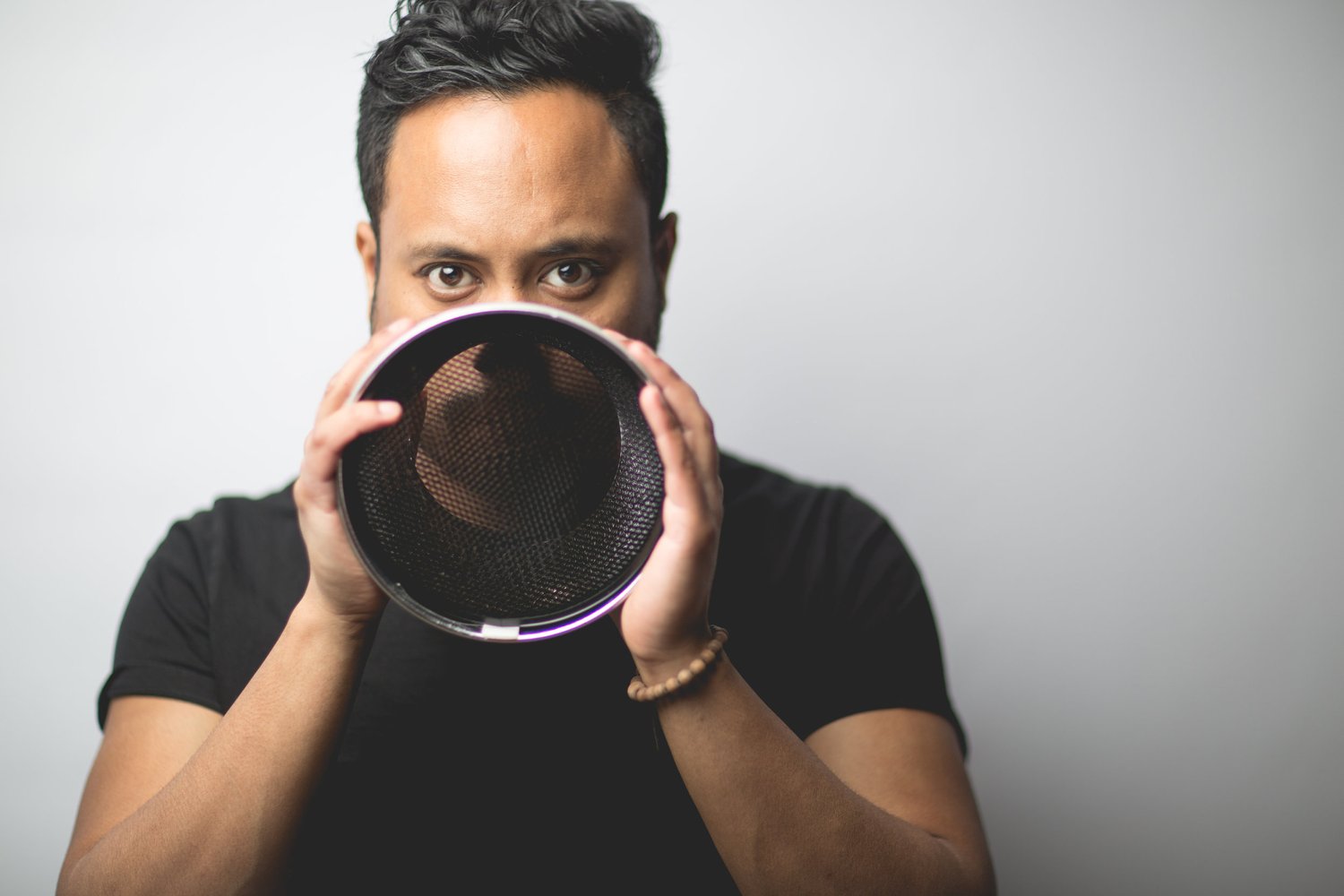 Portrait man studio lens hood black t-shirt – About