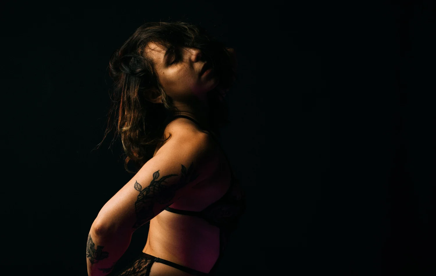 Woman dark studio lingerie boudoir moody – Portrait