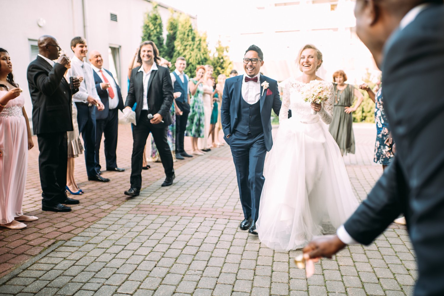 Wedding bride groom guests confetti outside celebration – Wedding Photography
