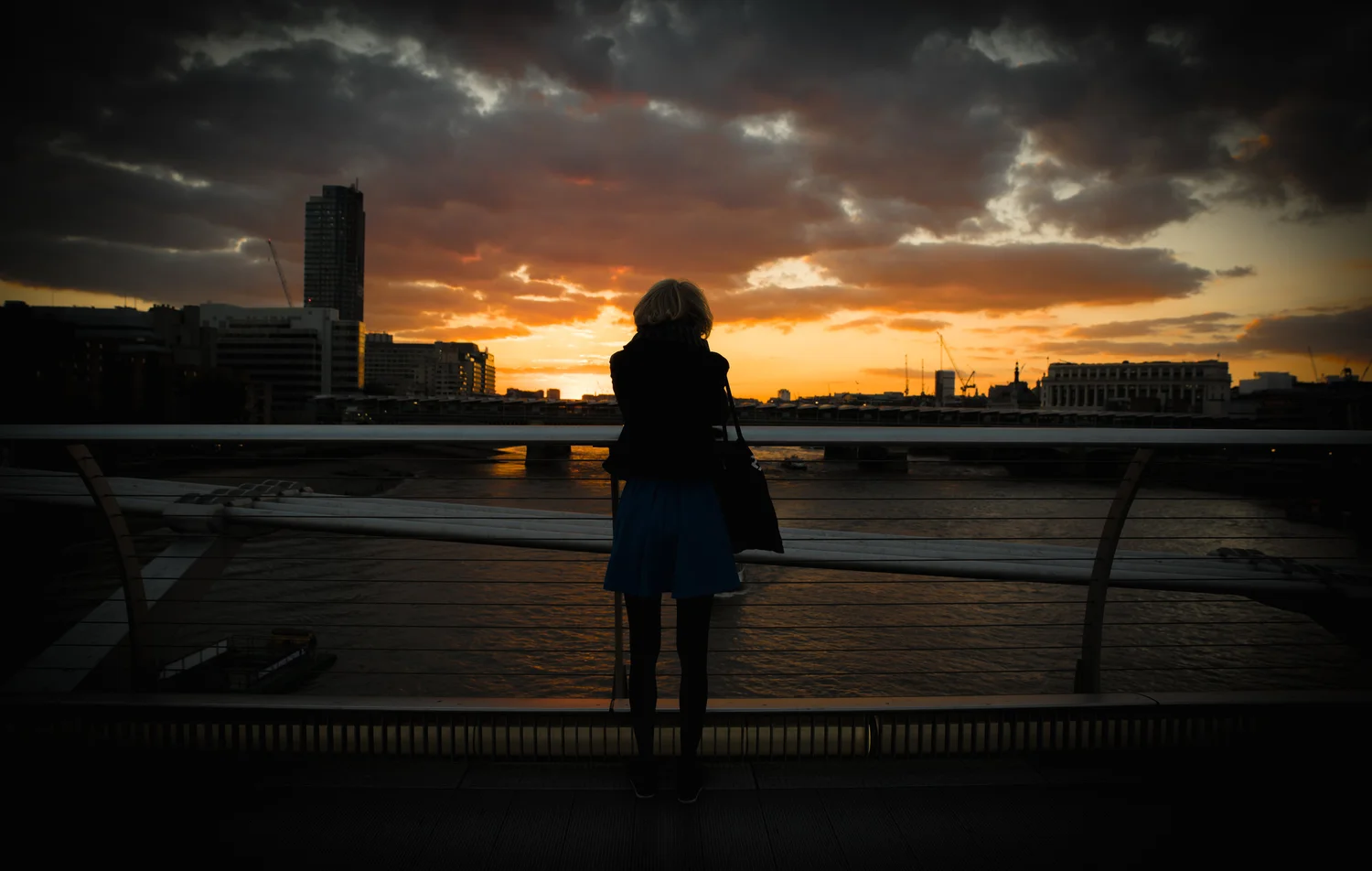 Silhouette sunset woman city skyline evening river – Landscape