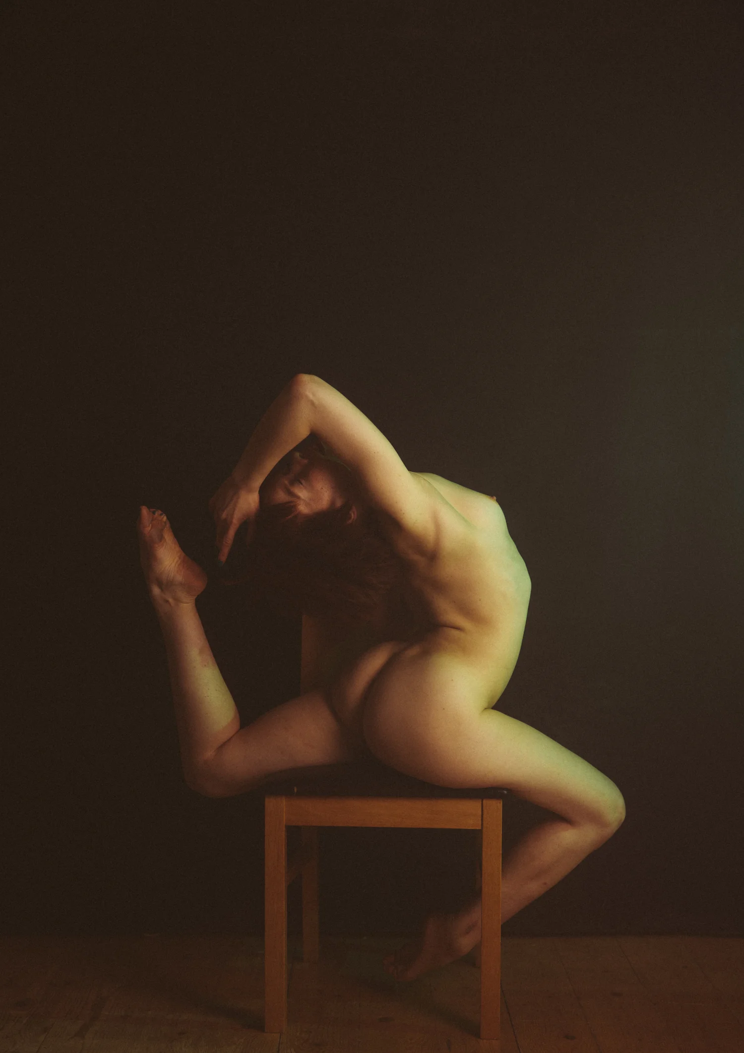 Nude woman studio artistic pose stool – Portrait