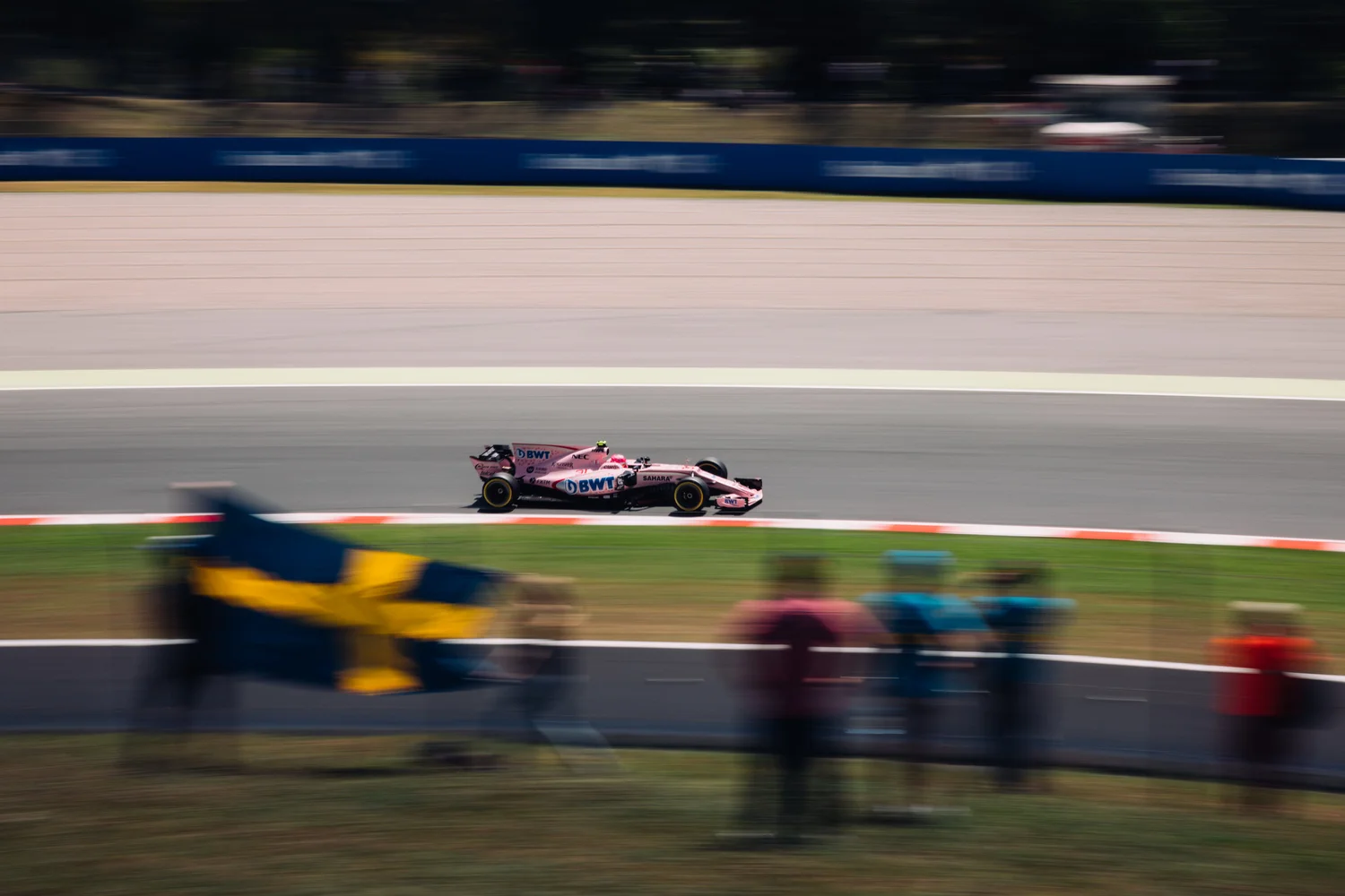 Motorsport racing car night pink flags crowd – Sports