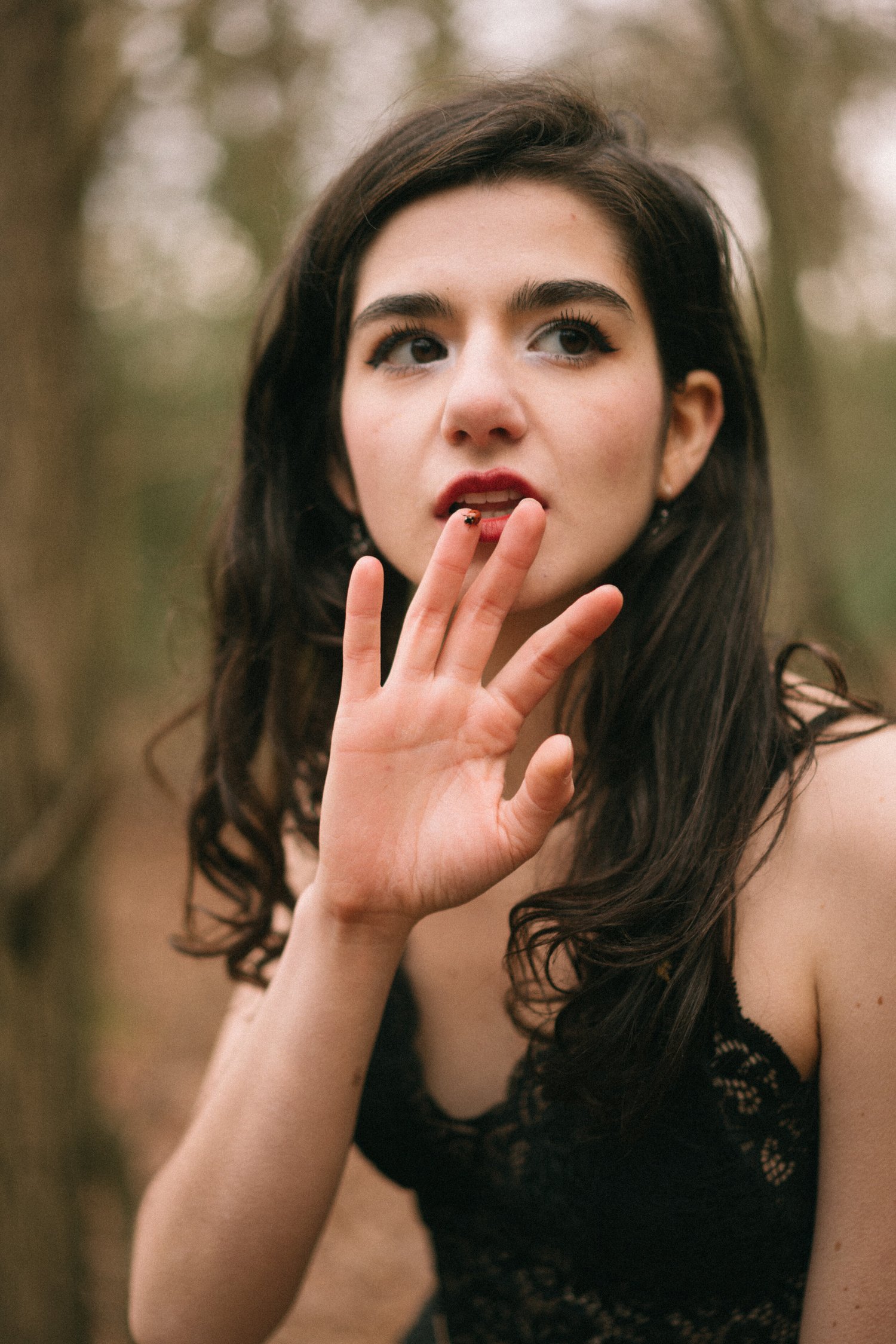 Woman red lips forest close-up beauty – Portrait
