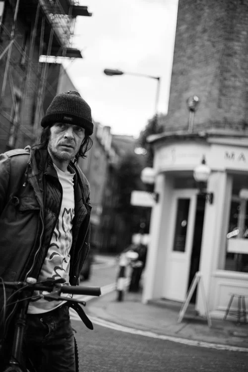 Street black and white man smoking london – Street