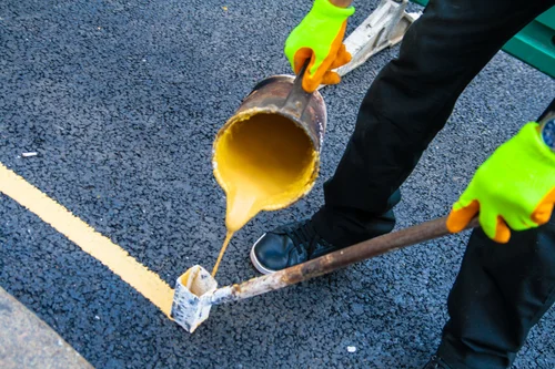 Paint painting road workers yellow gloves hands – Street