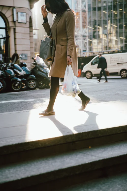 Street woman walking shadow light shopping bag – Street