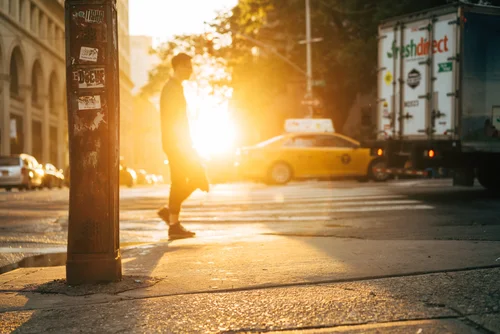 New york street sunset sun flare man – New York