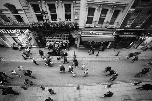Aerial black and white street people market – Street