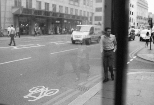 Street man leaning wall city road black – Street