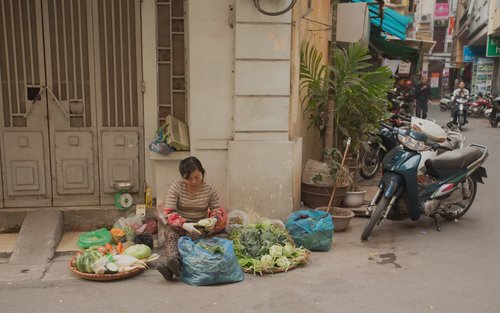 Vietnam hanoi street vendor woman vegetables motorbike – Vietnam