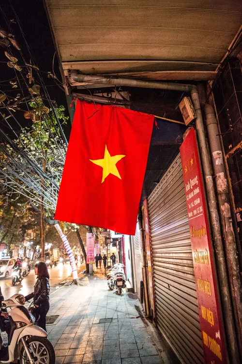 Vietnam flag red star street hanoi – Vietnam