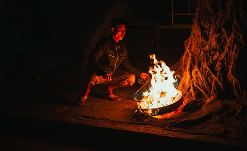 Vietnam fire night man cooking flames – Vietnam