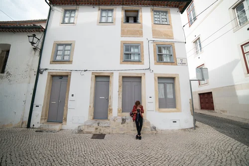 Portugal street woman red white houses cobbles – Portugal