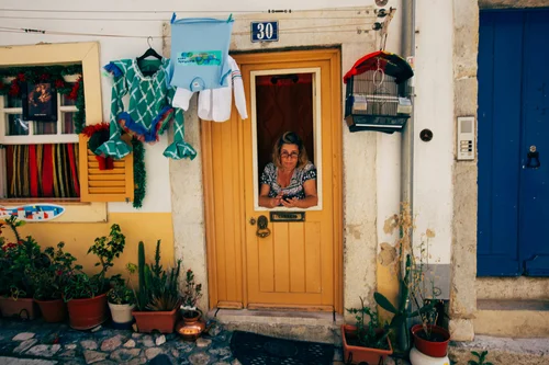 Portugal man window door laundry street lisbon – Portugal