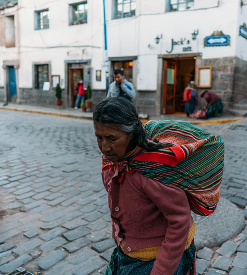 Peru woman traditional dress street cusco carrying – Peru