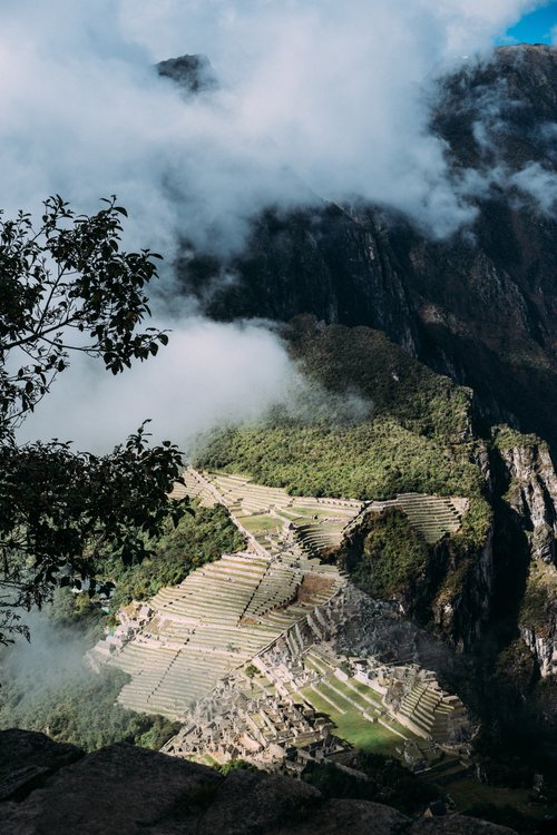 Peru machu picchu clouds ruins mountains portrait – Peru