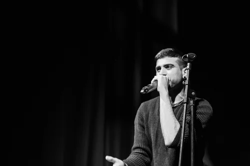 Singer man stage dark black and white – Cynical headliner show