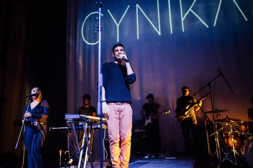 Singer man stage cynical band concert live – Cynical headliner show