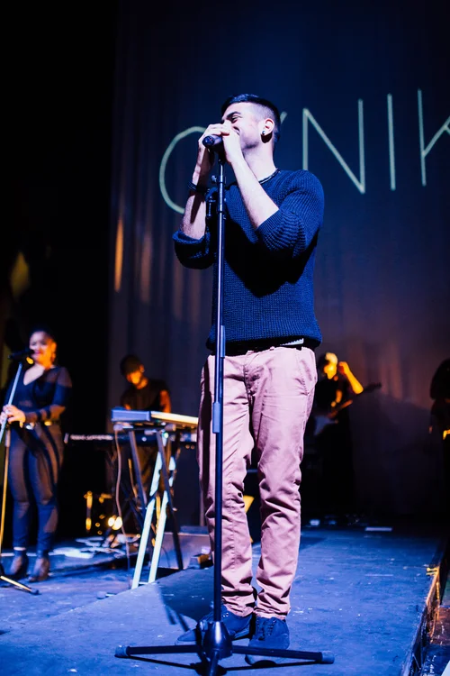 Singer man stage cynical band blue concert – Cynical headliner show