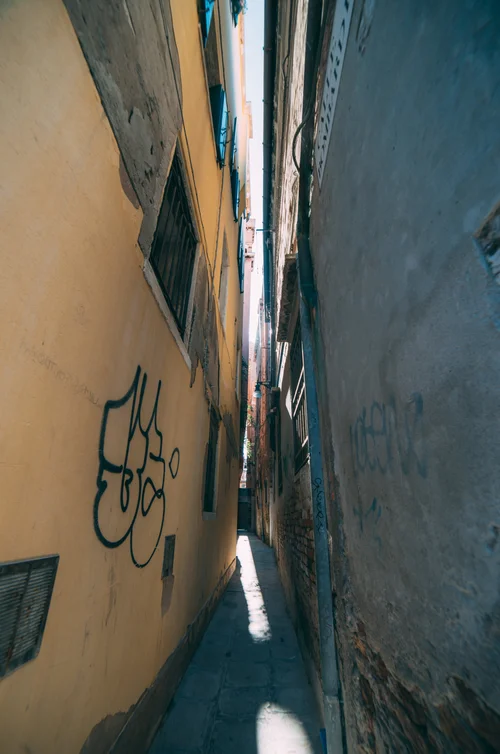 Venice narrow alley street yellow wall – Italy Venice