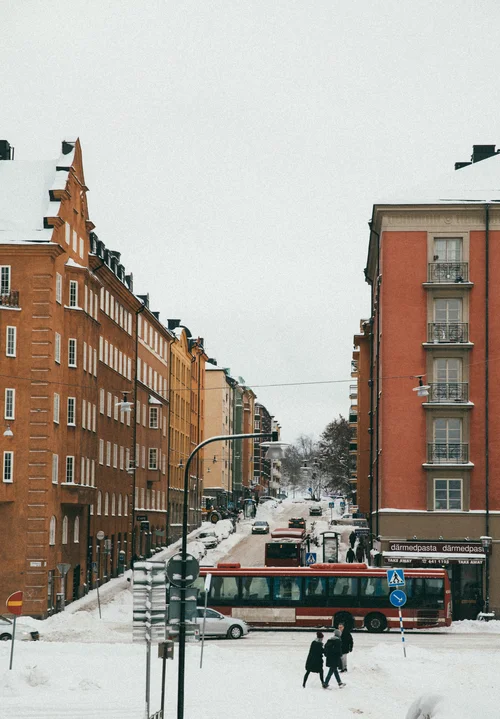 Stockholm street snow buildings bus winter – Stockholm