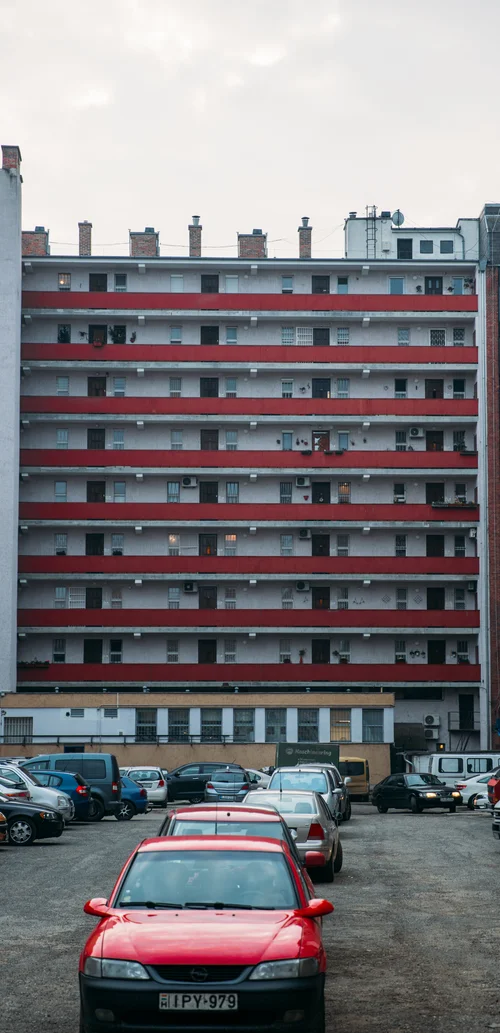 Budapest apartment block building red cars socialist – Budapest