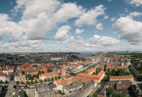 Copenhagen city aerial view rooftops clouds panorama – Copenhagen