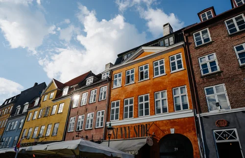 Copenhagen nyhavn colourful buildings facade sky – Copenhagen
