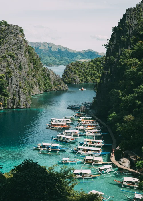 Philippines coron palawan lagoon boats turquoise limestone – Philippines