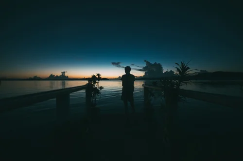 Philippines silhouette sunset pier people sea – Philippines