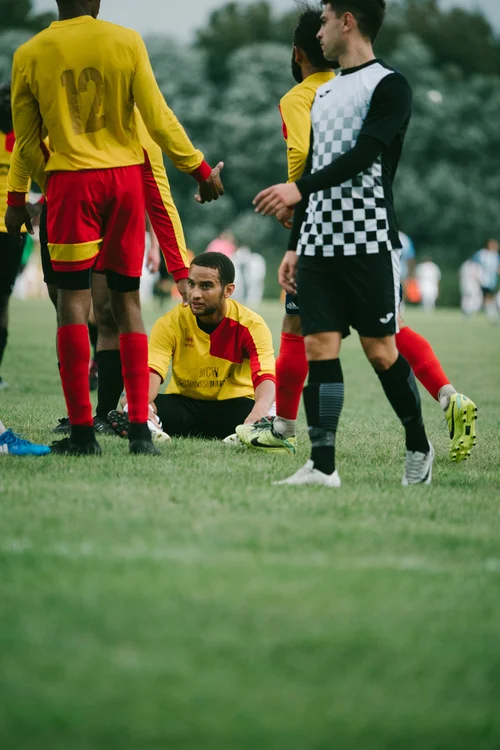 Grass roots football hackney marshes players stretching – Day 1 - Introduction